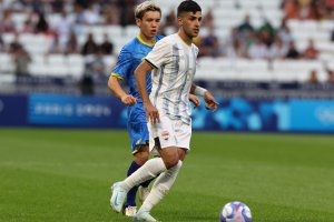 LYON, FRANCE - JULY 24: Ahmed Maknzi of Iraq in action during the Men's group B match between Iraq and Ukraine during the Olympic Games Paris 2024 at Stade de Lyon on July 24, 2024 in Lyon, France. (Photo by Claudio Villa/Getty Images)