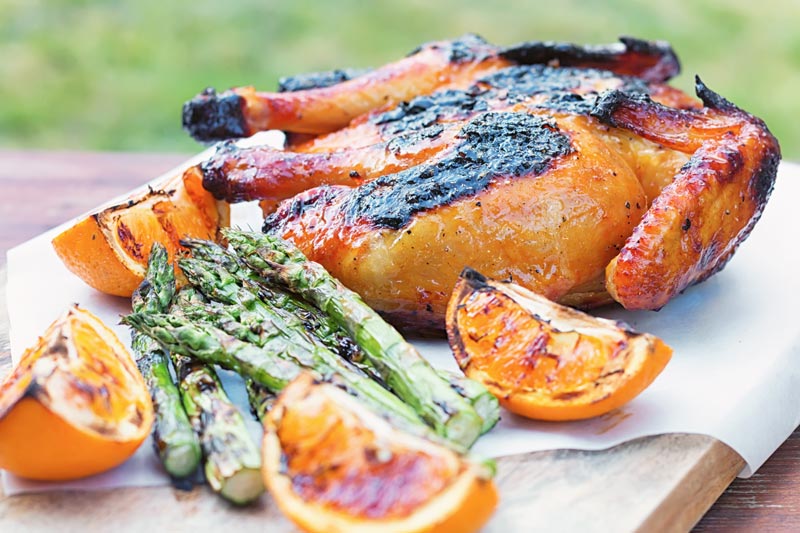 grilled chicken on a cutting board